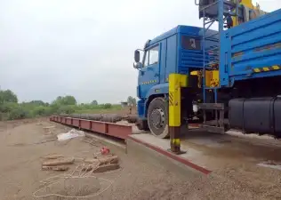 Строительство автомобильных весов для ЗАО "Гарское...